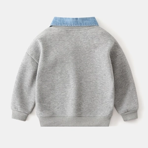 Rear view of children's grey sweatshirt featuring a blue denim collar detail