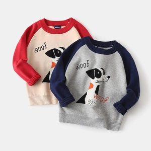 Close-up of knit texture and cute dog embroidery on these children's raglan sweaters