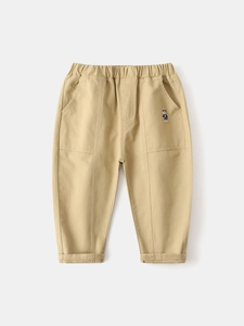 Beige kids cotton casual pants featuring elastic waist and cute bear embroidery detail