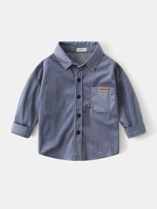 Blue corduroy long sleeve shirt for boys featuring classic collar and front pocket