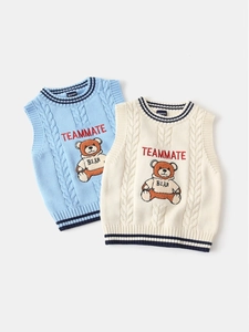 Kids knitted bear vest in light blue and cream featuring classic cable knit textures