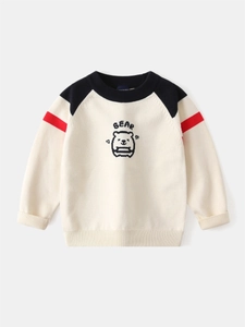 Toddler fall sweater with navy blue raglan sleeves and bear embroidery on cream knitwear