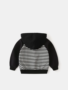 Kids long sleeve hooded sweatshirt featuring stylish black and white stripe patchwork design