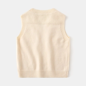 Detail of off-white knit vest showing honeycomb texture and ribbed hem on flat layout