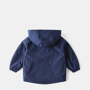 Detail view of dark blue hooded kids jacket with elastic cuffs and high-quality texture