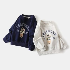 Detail of navy and grey cotton sweatshirts with bear embroidery and ribbed cuffs