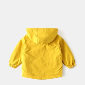 Rear view of yellow kids hooded jacket showing elastic cuffs and windproof fabric details