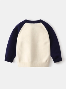 Classic cream and navy blue cable knit sweater for boys with ribbed cuffs and crew neck