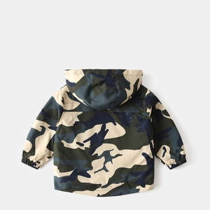 Detail of hooded windbreaker featuring classic camouflage pattern and elastic cuffs