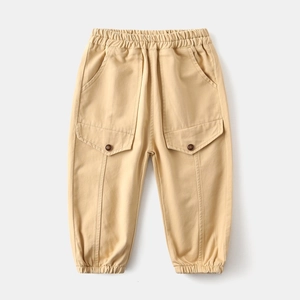 Detailed view of khaki cargo pants for boys with elastic waistband and large side pockets