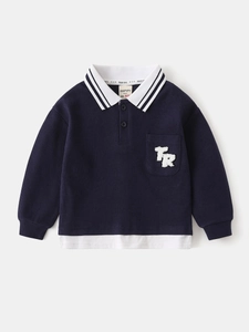 Kids long sleeve navy waffle knit polo shirt with white contrast collar and TR embroidery