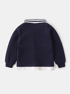 Kids navy waffle knit long sleeve polo shirt with white stripe collar and layered hem