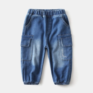 Detail of boys denim cargo pants showing elastic waist and LOVEWAPPY embroidery