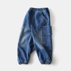 Detail of boys denim cargo pants with elastic waistband and LOVEWAPPYPY embroidery