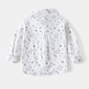 Back view of boys' white shirt showing blue stars print and pleated yoke detail
