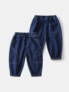 Classic dark blue boy's denim jeans with elastic waist and stylish knee stitching details