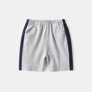 Detail of grey cotton blend boys shorts with navy side stripes and elastic waistband