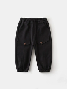 Classic black cargo pants for boys with elastic waist and large buttoned pockets