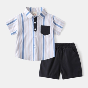Detailed flat lay of striped short-sleeve shirt with black pockets and shorts set