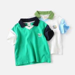 Flat lay of boys cotton polo shirts with contrast sleeves and cartoon embroidery