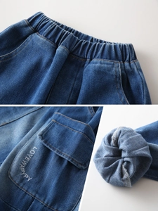 Boys stylish blue denim pants featuring elastic waist and side pockets with embroidery