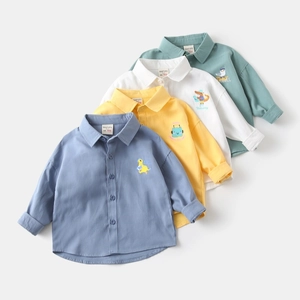 Flat lay detail of kids long sleeve cotton shirts with cute cartoon animal embroidery