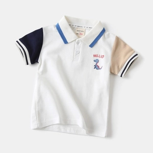 Detail of color-block boys' Polo shirt with embroidered cartoon dinosaur and HELLO text
