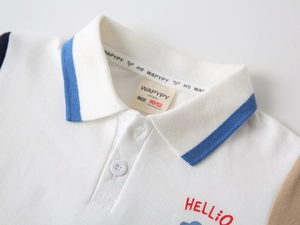 Detail of boys' polo shirt collar with blue stripes and HELLO cloud embroidery