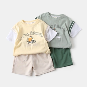 Detailed view of kids summer cotton sets with dinosaur prints and fake two-piece sleeves