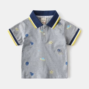 Close-up of kids polo shirt detailing space prints and striped ribbed collar