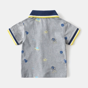 Close-up of grey cotton polo shirt with space prints and striped knit collar details