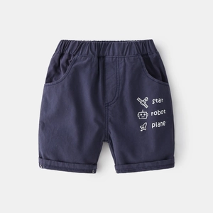 Detailed view of navy blue boys cotton shorts featuring cartoon space prints and elastic waist