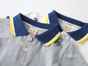 Detailed close-up of ribbed polo collars with stripes and high-quality pique fabric texture