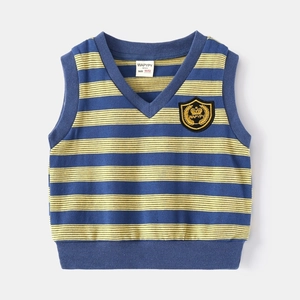 Detail of V-neck striped knit vest for boys with a premium crest embroidery badge