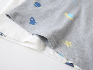 Detailed view of kids cotton boxer shorts featuring space prints and high-quality stitching