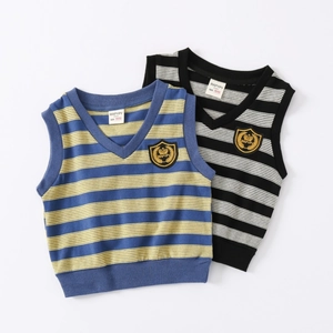 Close-up of boys V-neck striped knit vests with detailed embroidery and ribbed trim