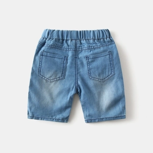 Detail view of boys' light blue washed denim shorts featuring elastic waistband and back pockets