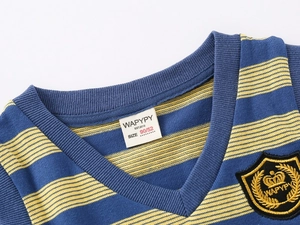 Detail of V-neck striped kids sweater vest with blue yellow stripes and crown patch