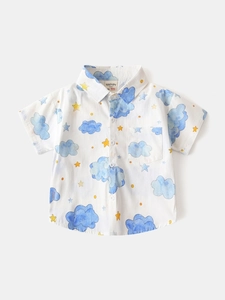Kids short sleeve shirt with blue watercolor clouds and yellow stars on white fabric