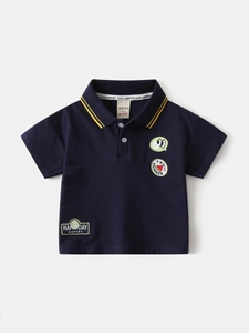 Polo enfant bleu marine en coton à manches courtes avec broderie de fruits et rayures jaunes