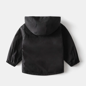 Back view of kids black hooded jacket with windproof fabric and elastic cuffs