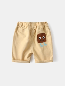 Boys summer cotton shorts in beige featuring a cute cartoon patch and elastic waist