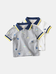 Short-sleeved cotton polo shirts for boys with cosmic astronaut and rocket prints