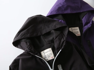 Close-up of children's hooded fleece jackets showing soft inner lining and zipper detail
