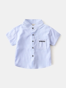 Light blue short-sleeved cotton shirt for boys with V-neck collar and chest pocket embroidery