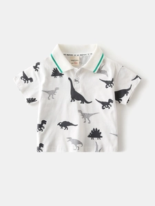 Kids short sleeve polo shirt with all-over dinosaur print and green striped collar