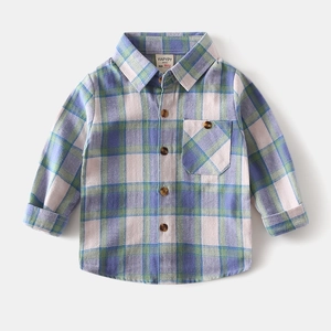 Detailed flat lay of boys plaid long sleeve shirt with wood-style buttons and chest pocket