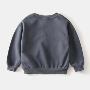 Detail of blue-grey boys' sweatshirt showing ribbed cuffs and faux-layered white hem