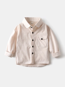 Chemise à manches longues en coton pour petit garçon couleur abricot clair et boutons noirs