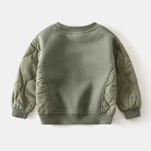 Detailed view of kids quilted patchwork sweatshirt with gray-green textured fabric back